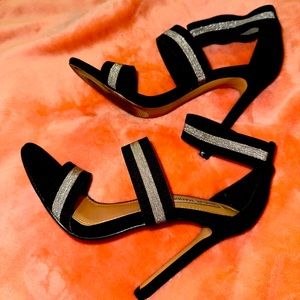 Steven Madden black with silver 4 inch heel.